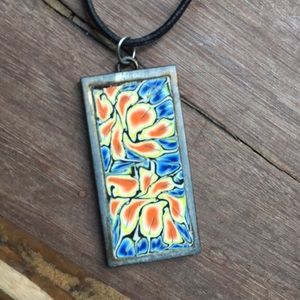 Enamel metal necklace.  Leather string.  Tree of life clasp.